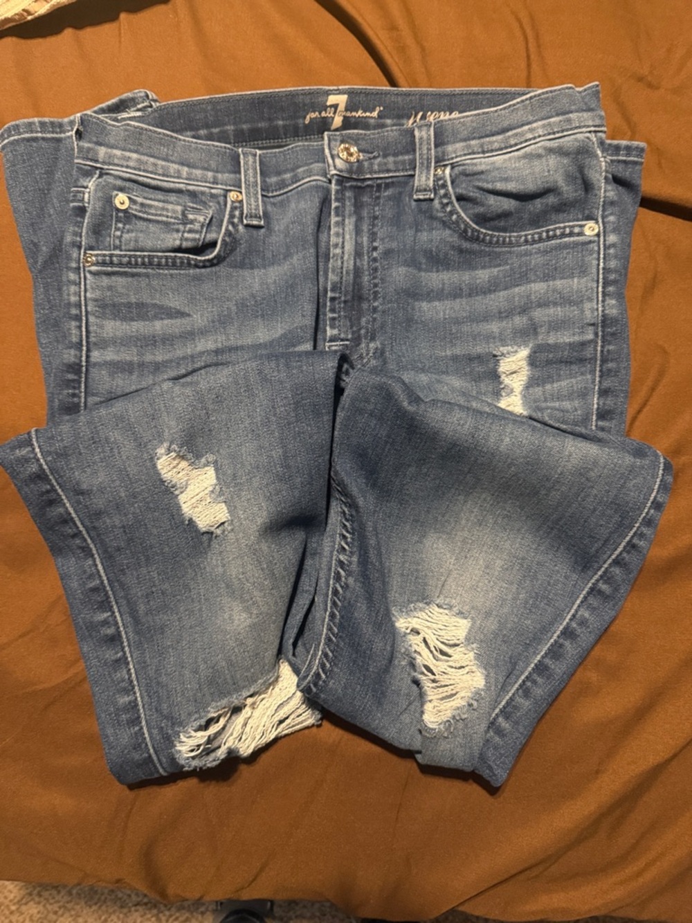 Distressed Blue Denim Jeans